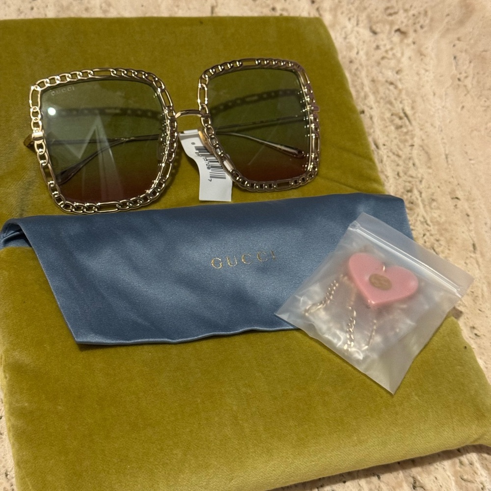 Gucci Women's Sunglasses with Gold Frame and Green Lenses